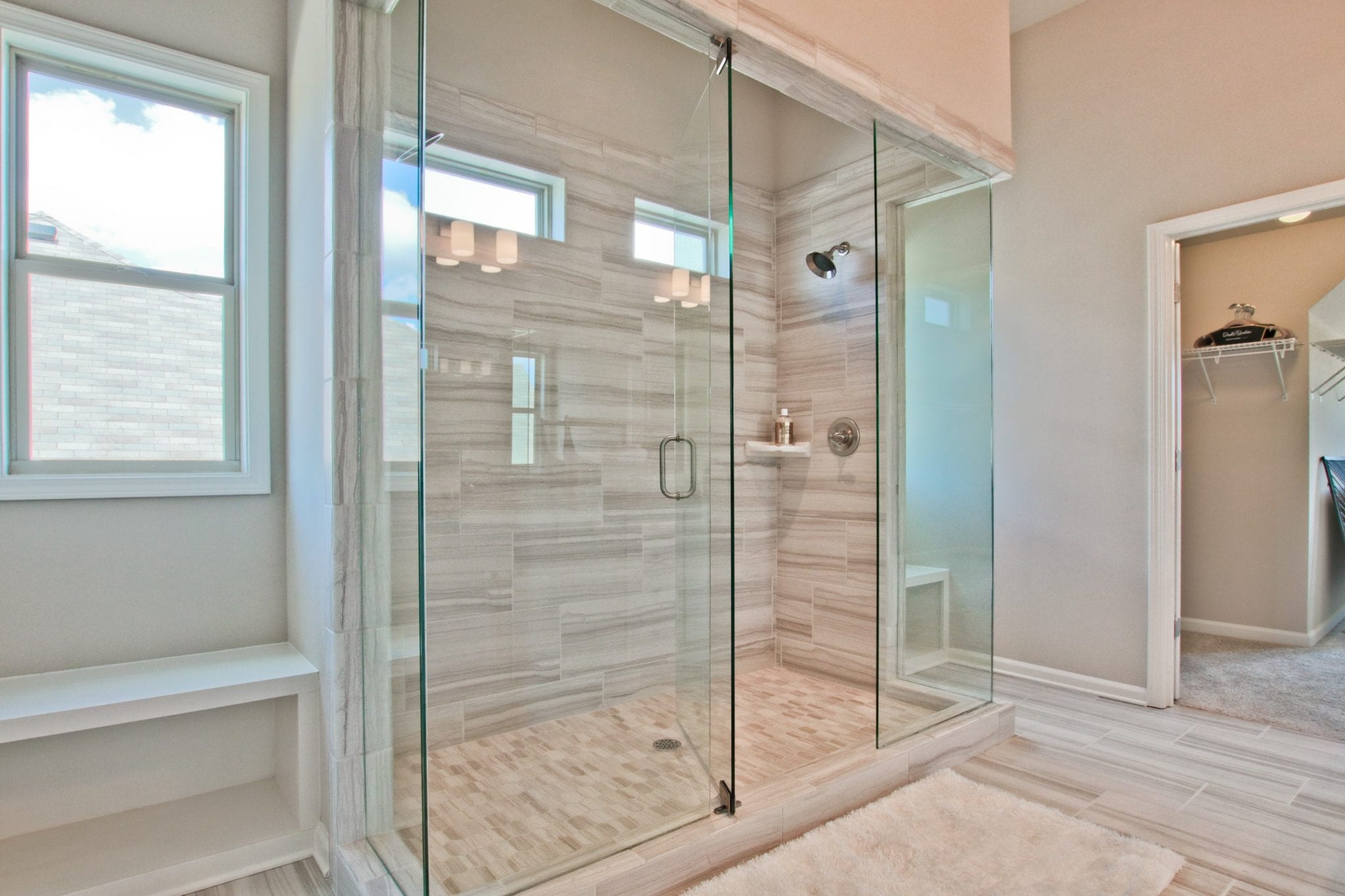 Love the new super sized, no tub showers in your owner's suite bathroom