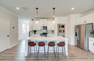 modern farmhouse kitchen with island, model home