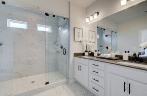 cypress park cheshire plan primary bathroom with 7 ft glass enclosed shower