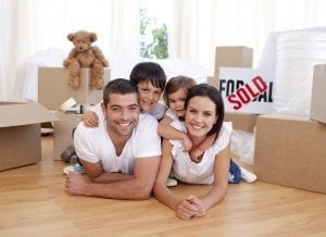 Happy family lying on floor after buying new house, Homeowner Referral Program