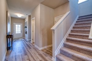 model home 13-Paterson-Chafin-Communities-Stairs-to-Foyer