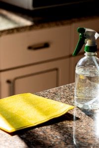 spray bottle and microfiber to clean granite counter tops