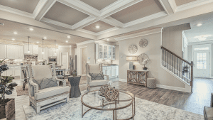 chafin communites living room with coffered celings