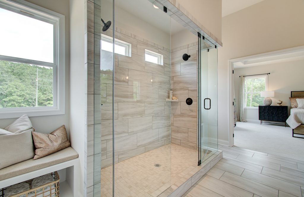 enlarge glass shower