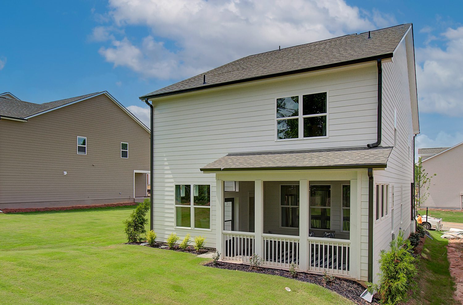 chestnut plan farmhouse style home white exterior