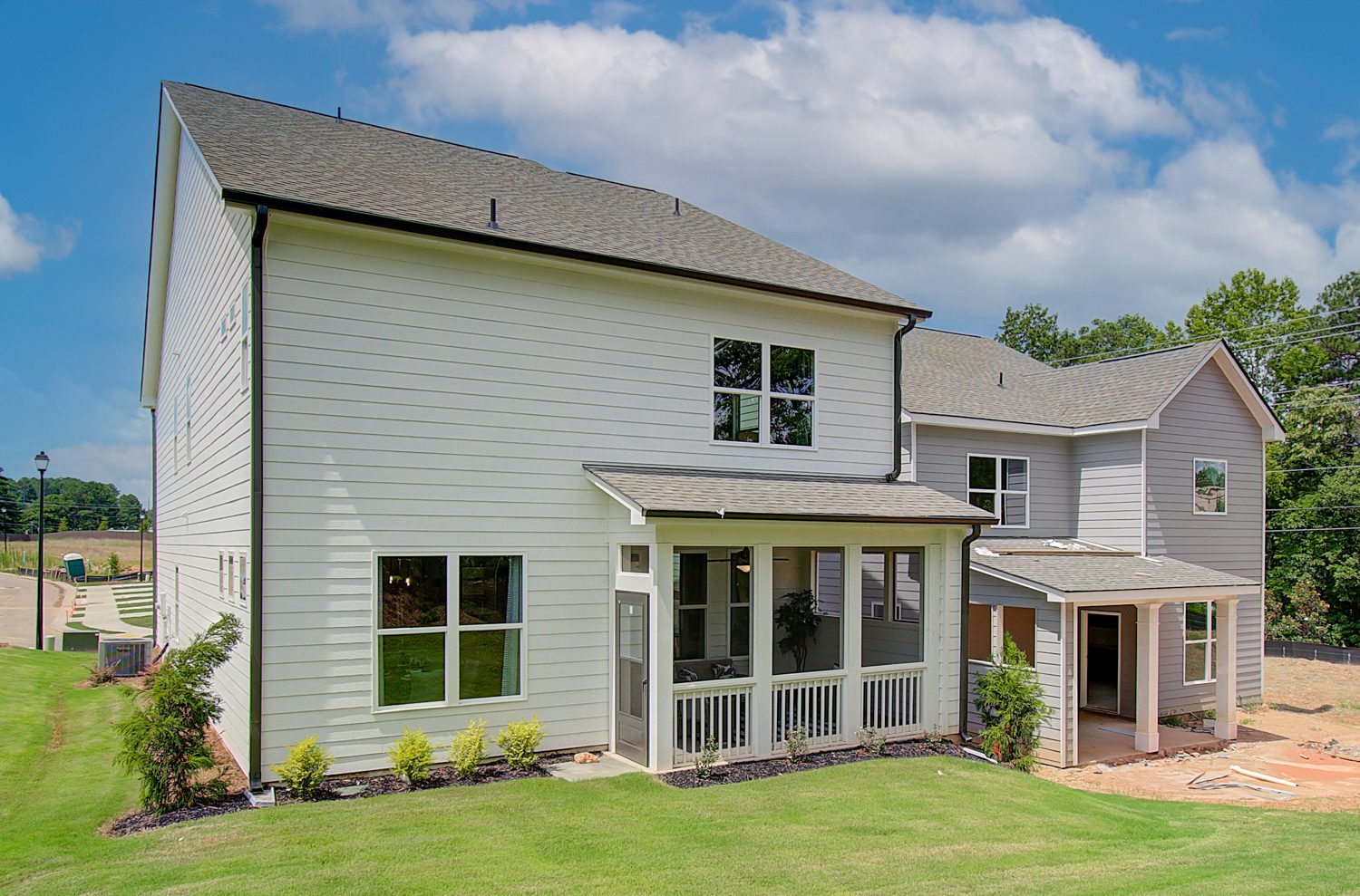 chestnut plan farmhouse style home white exterior