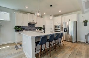 kitchen island in the chestnut plan