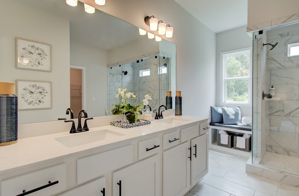 double vanity in primary suite bathroom