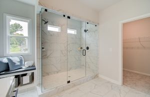 7 foot glass enclosed shower in primary suite