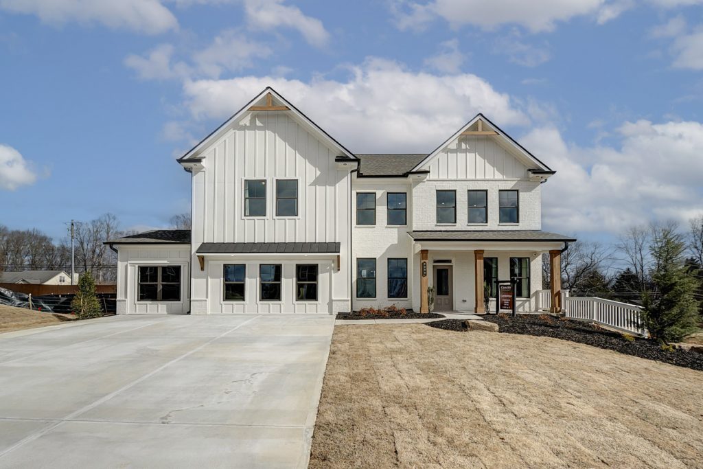 overlook at marina bay model home front farmhouse by chafin communities