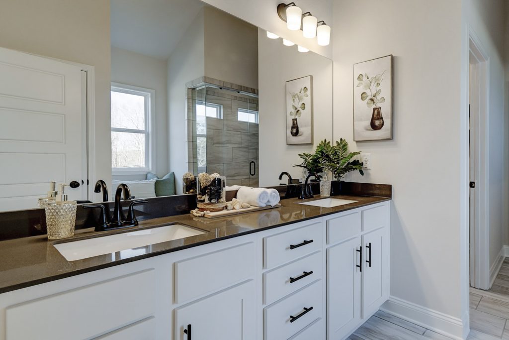 enlarged shower, overlook at marina bay, crofton place manor