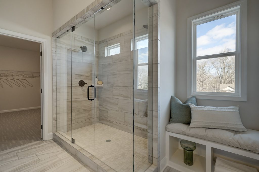 options for primary bathrooms, enlarged shower with glass doors