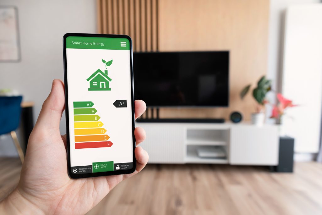 Energy efficiency mobile app on screen, eco smart home, smart home